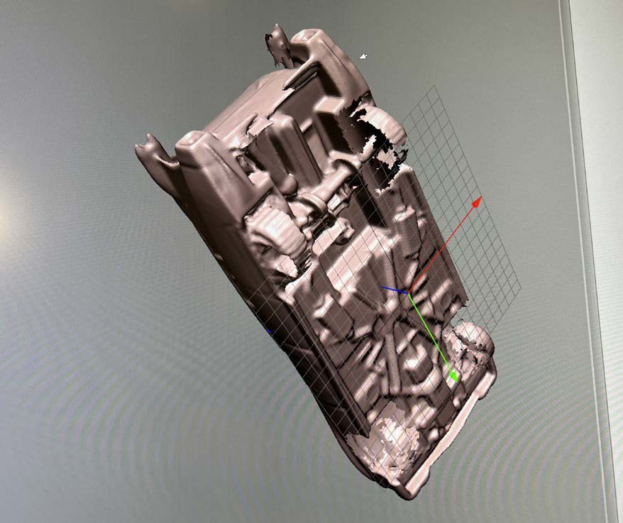 A scanned vehicle model displayed in a 3D application.